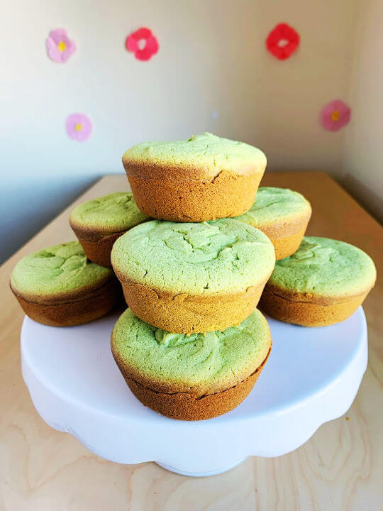 green tea mochi muffin piled on plate