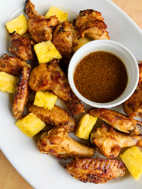 teriyaki wings with sauce on plate