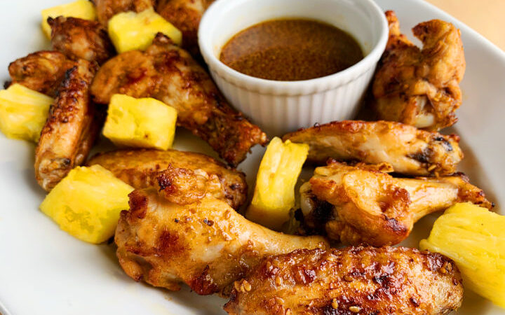 teriyaki wings with pineapple chunks