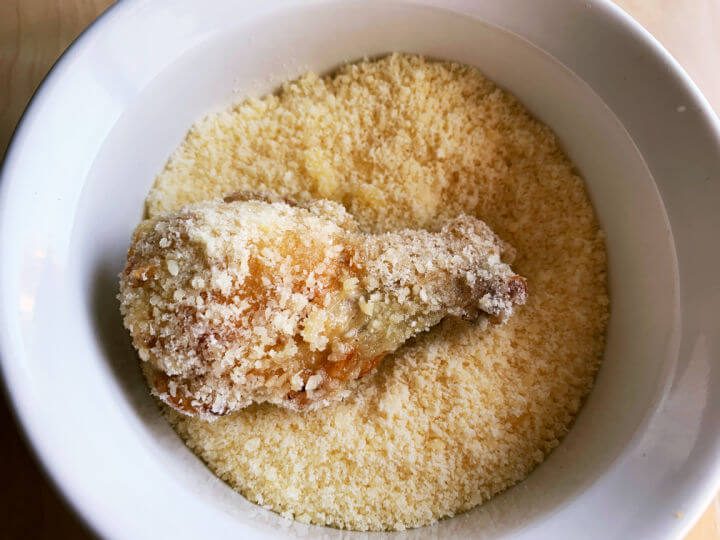 wings dipping in garlic parmesan sauce