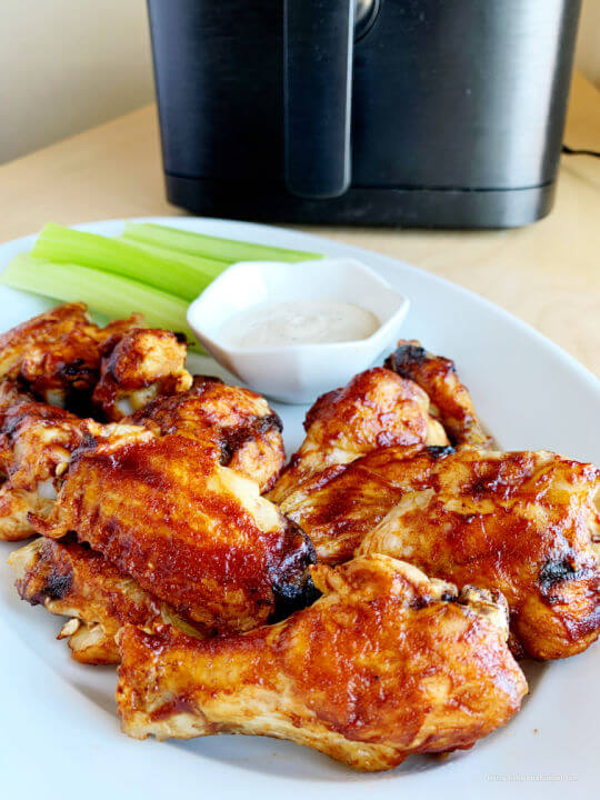 bbq wings in front of air fryer