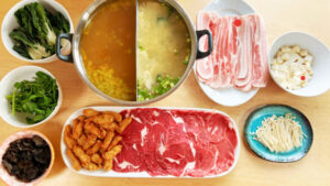 Hot Pot with meat and vegetable side dishes