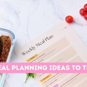 meal planner sheet on table with a glass tupperware of meat and rice