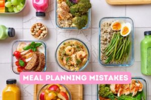 Table full of meals in glass tupperware without lids
