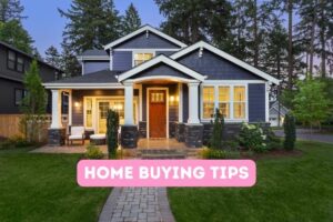 blue house with white trip and red door on a green lawn with brick pathway at dusk. Text: Home Buying Tips